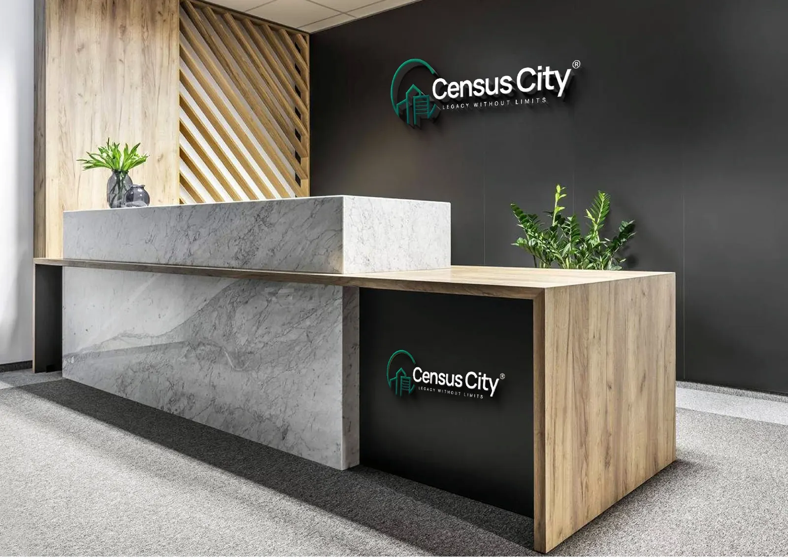A reception desk with the Census City logo on the wall.